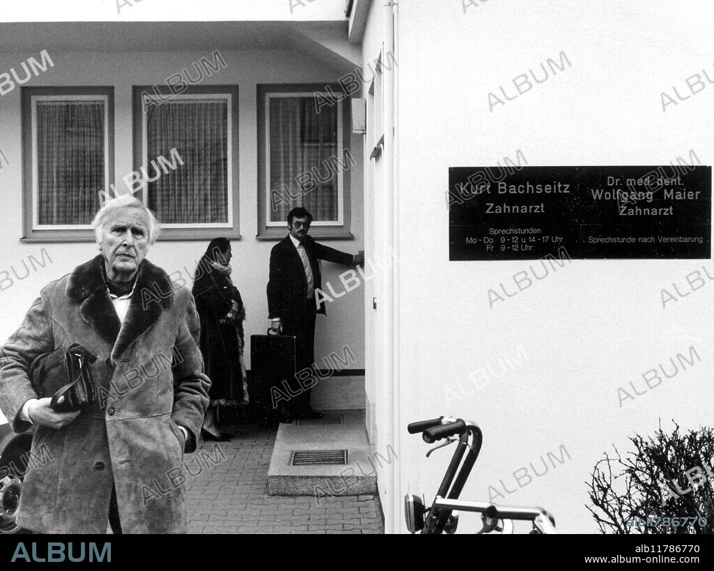 Professor Hans Bender investigating the case of a mystery voice at a dentist's surgery at Neutrabling, Bavaria, Germany, in the 1980s. It was hoaxed by 17 year old assistant Claudia. - ©TopFoto / Fortean.