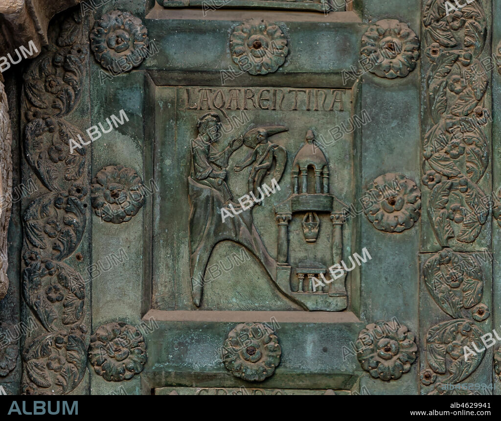 Monreale Cathedral, the gate by Bonanno Pisano (1185-6): bronze tile depicting "Christ's Temptation" (scene of the New Testament).. The gate is signed "Bonanno civis pisanus". It depicts five scenes of the Old Testament at the bottom, starting with Adam and Eve, and five scenes of the New Testament at the top, ending in "Christ and Mary in the glory of Paradise".