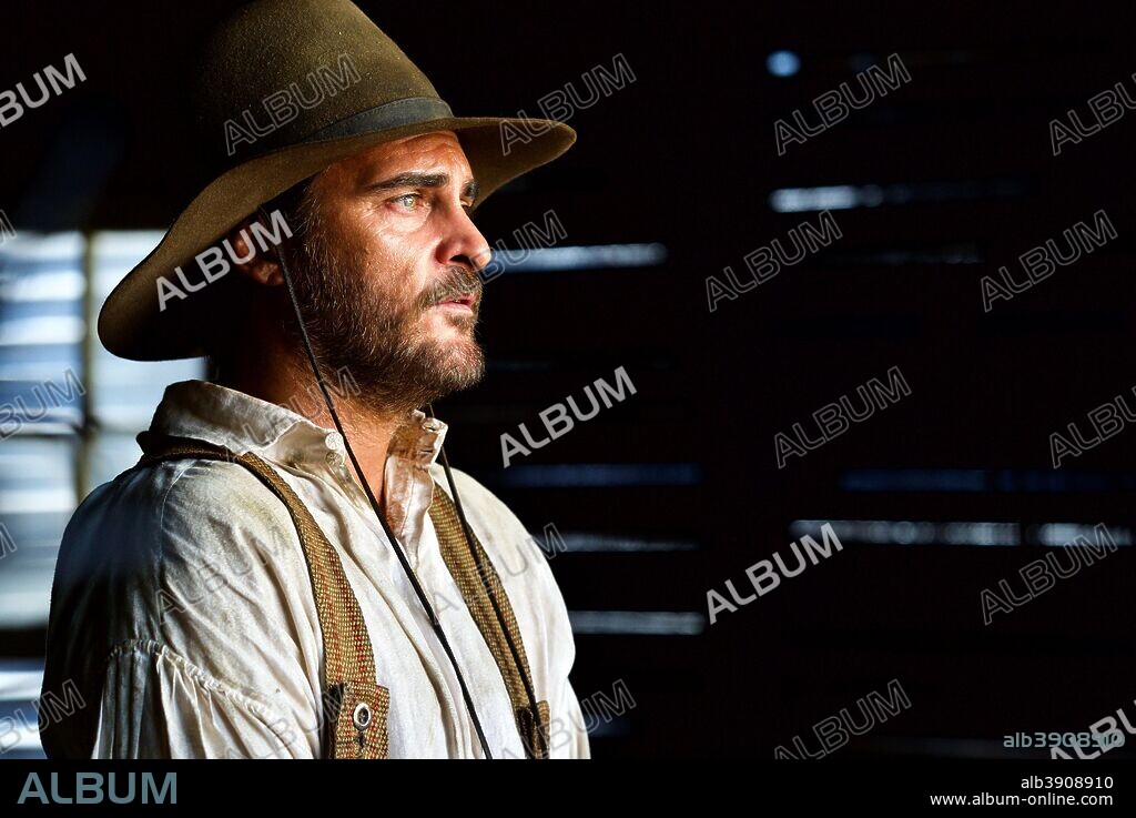 JOAQUIN PHOENIX en THE SISTERS BROTHERS, 2018, dirigida por JACQUES AUDIARD. Copyright ANNAPURNA PICTURES.