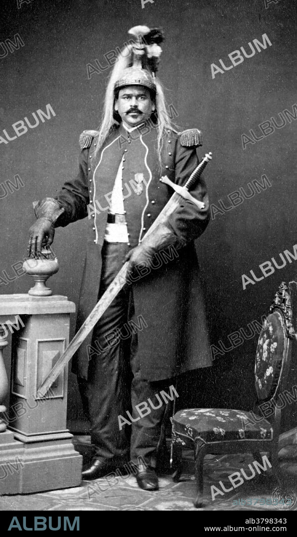 Routh Goshen, born Arthur James Caley (1827 - February 12, 1889) was an Anglo-American sideshow performer. He was billed as the tallest man in the world at 7 ft, 11 inches and 620 pounds but was most likely no more than 7 ft, 5 inches and 400 pounds. His true origins were kept secret from the public during his performance years and were obscured by the many biographies that were created to publicize him. His actual origins came out slowly after his death. In 1859, he had become known as the "Arabian Giant." By November 1863 he was being billed along side Anna Swan, General Tom Thumb, and Commodore Nutt at Barnum's American Museum. In 1876, he toured with Commodore Nutt as part of the Lilliputian Comic Opera's performance of a version of the story of Jack the Giant Killer. He toured with P. T. Barnum's New and Greatest Show on Earth (1878-80, 1883). In Summer 1882, he performed at Atlantic City, New Jersey. After his retirement he settled in Middlebush, New Jersey and gained the nickname the Middlebush Giant. He died in 1889 at the age of 62. Larry Gottheim Collection of stereographs, dated 1864.