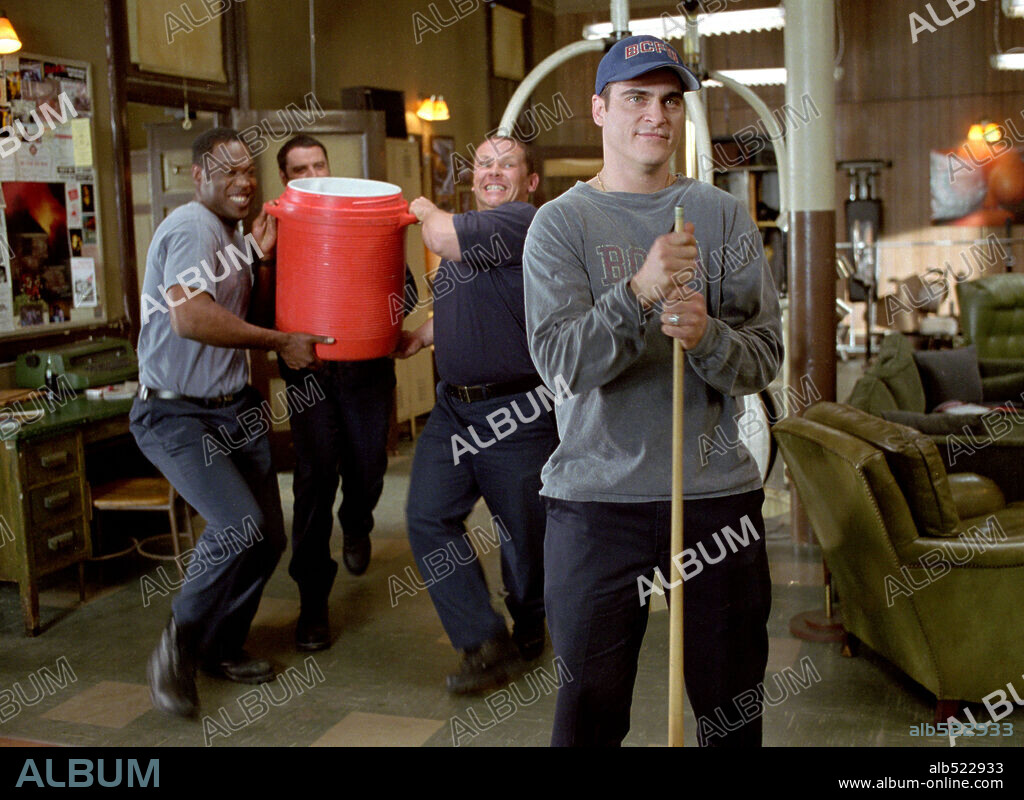 JOAQUIN PHOENIX, JOHN TRAVOLTA, KEVIN CHAPMAN and KEVIN DANIELS in LADDER 49, 2004, directed by JAY RUSSELL. Copyright TOUCHSTONE PICTURES.