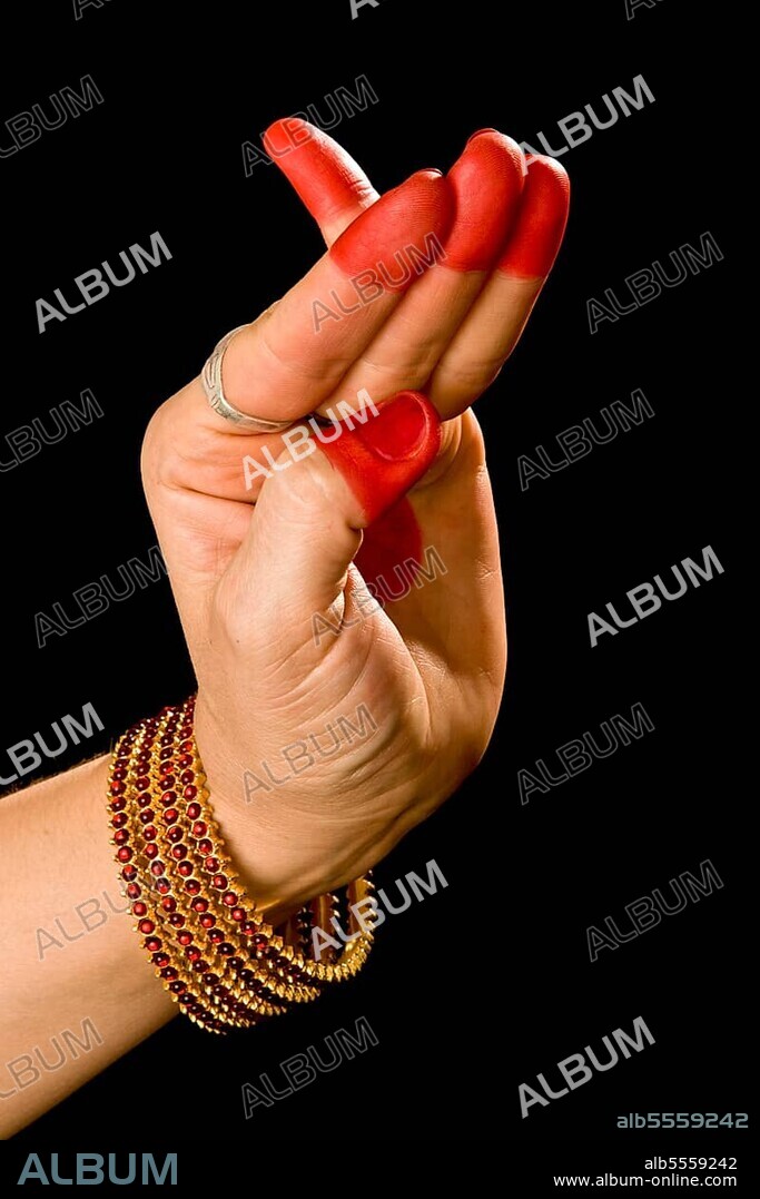 Woman hand showing Chatura hasta (hand gesture) (also called mudra) (meaning "Square") of indian classic dance Bharata Natyam. Also used in other indian classical dances Kuchipudi and Odissi