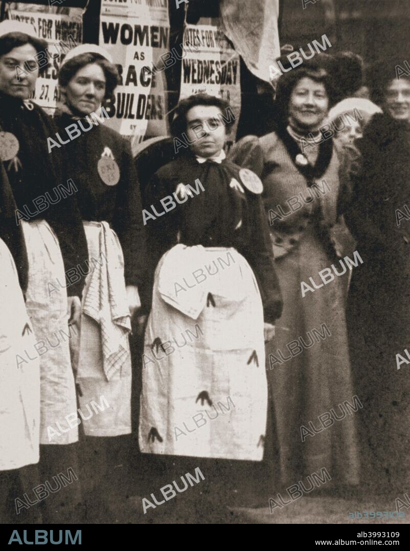 Ada Flatman, British suffragette, at a demonstration she organised in Liverpool, 1909. Ada Flatman (1876-1951) is second from the right. The women in uniform are wearing replica prison clothing and prison number badges, paying tribute to the members of the suffragette movement who had been imprisoned. Ada Flatman (1876-1951) is second from the right in the photograph. She was herself  an ex-prisoner, having served one month in Holloway Gaol for her presence on a deputation to the House of Commons in the autumn of 1908.