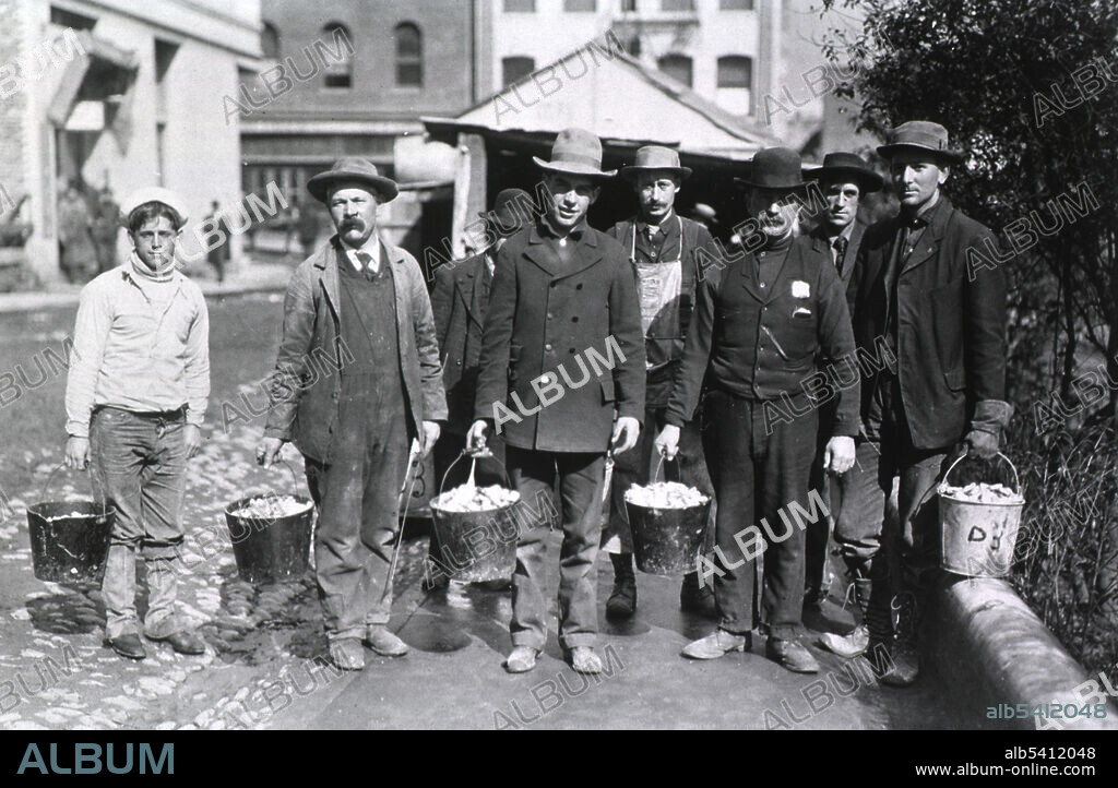 Public health service workers holding buckets filled with rat bait, San Francisco, California, during the second bubonic plague epidemic of 1907-1908. The first, centered in Chinatown, was in 1900-1904, the first plague epidemic in the continental US.