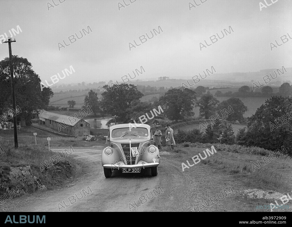 Ford  V8 Saloon. 1937 Vehicle Reg. No.  DLP300.  Event Entry No: 3. Place: S.W.A.C. Welsh Rally. Date: 30.6-3.7.37.