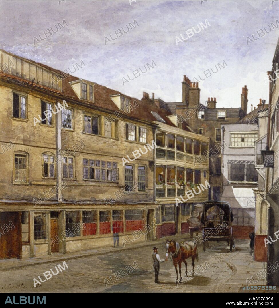 The George Inn, Borough High Street, Southwark, London, 1880. View of the famous galleried coaching inn, now owned by the National Trust, with a man with a horse in the street outside.