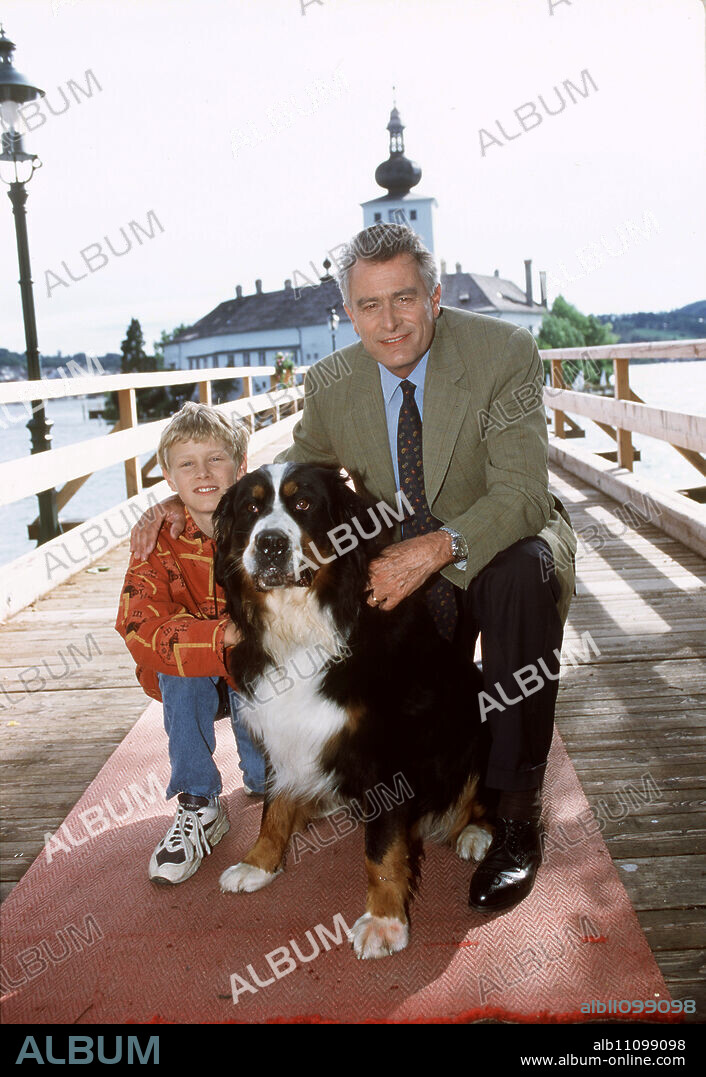 SCHLOSSHOTEL ORTH - Pictured: Hotelier Wenzel Hofer (KLAUS WILDBOLZ) with his son Franzl (RUPERT APFL-NUSSBAUMER) Director: Stefan Klisch / Headline: SCHLOSSHOTEL ORTH.