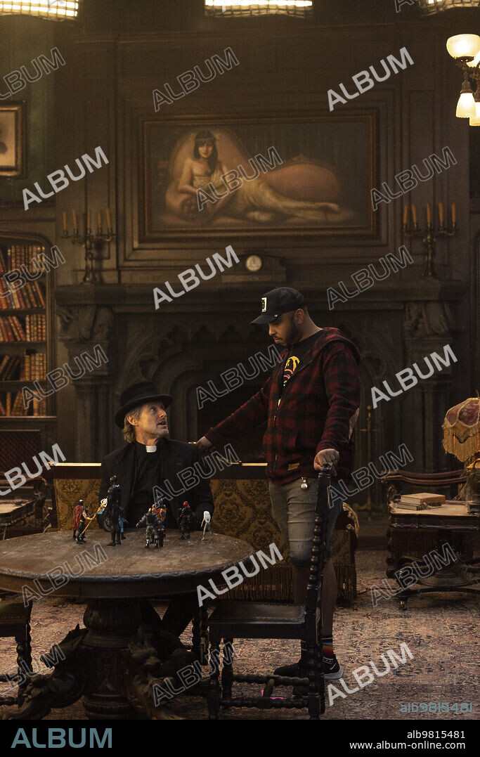 LAKEITH STANFIELD and OWEN WILSON in HAUNTED MANSION, 2023, directed by JUSTIN SIMIEN. Copyright WALT DISNEY PICTURES.