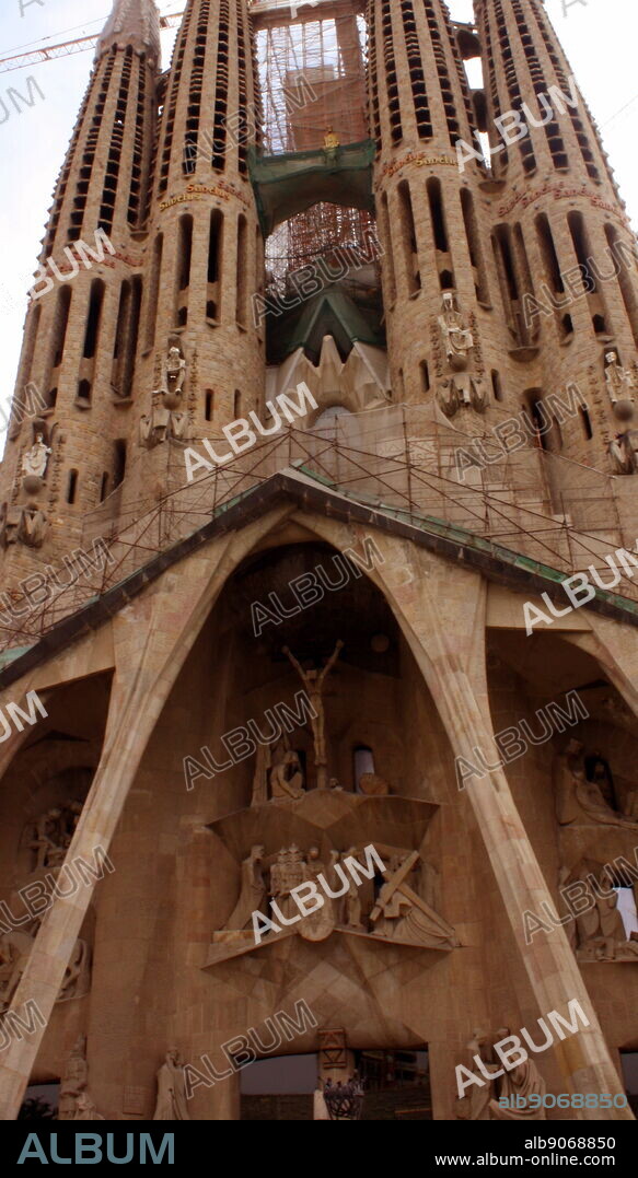 The Basilica I Temple Expiatori de la Sagrada Familia (Sagrada Familia). The very large Roman Catholic church was designed by Catalan architect Antoni Gaudi in a Spanish gothic style architecture as well as incorporating modernism, noucentisme and art nouveau. Although construction began in 1882 it was finally opened November 2010. Barcelona. Spain 2013.
