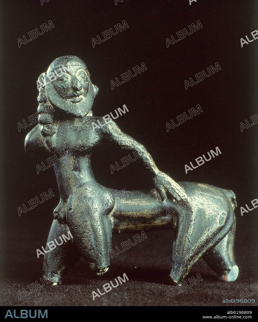 CENTAURO DE ROLLOS PROCEDENTE DE CAMPO DE CARAVACA (MURCIA) -  SIGLO VI AC - BRONCE.