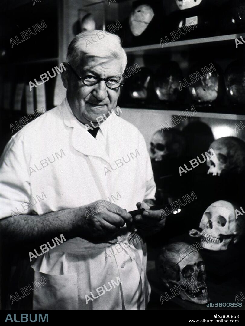 Milton Helpern, Chief Medical Examiner, New York City, poses for the cover of Modern Medicine magazine, 1965. Milton Helpern (1902-1977) received his M.D. from Cornell University in 1926, joined the staff of the New York City Medical Examiner's Office in 1931, and taught forensic pathology at New York University. In 1954 he became the city's chief medical examiner. During his long career, he personally performed or supervised 60,000 autopsies and was internationally recognized as an expert in forensic medicine. The New York Times called him 'Sherlock Holmes with a microscope'. A medical examiner is an appointed medically qualified officer whose duty is to investigate deaths and bodily injuries that occur under unusual or suspicious circumstances, to perform post-mortems, and sometimes to initiate inquests.