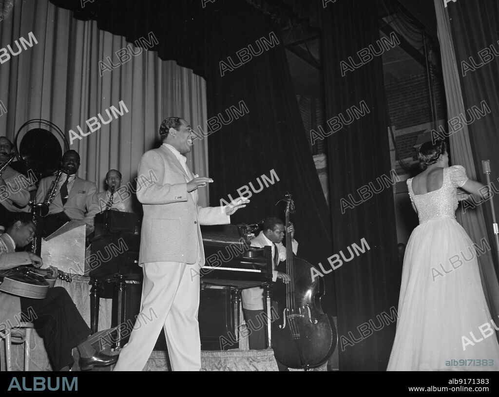 WILLIAM PAUL GOTTLIEB. Portrait of Duke Ellington, Barney Bigard, Ben Webster, Otto Toby Hardwick(e), Junior Raglin, and Fred Guy(?), Howard Theater(?), Washington, D.C., 1938.