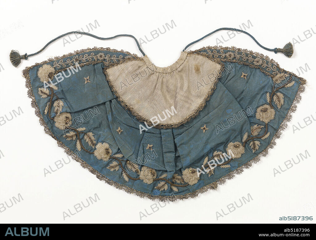Cape for an ecclesiastical figurine, Medium: silk, metallic yarns, glass beads Technique: ribbed plain weave, moire finish, embroidered; bobbin lace; lined with voile, Small cape for an ecclesiatic figure, the 'Bambino'. Blue moire with silver moire collar. Edged with silver lace. Embroidered vine design along edge with gold cord and sequins and white glass beads. Lined with pale blue silk voile., France, mid-19th century, costume & accessories, Cape for an ecclesiastical figurine.