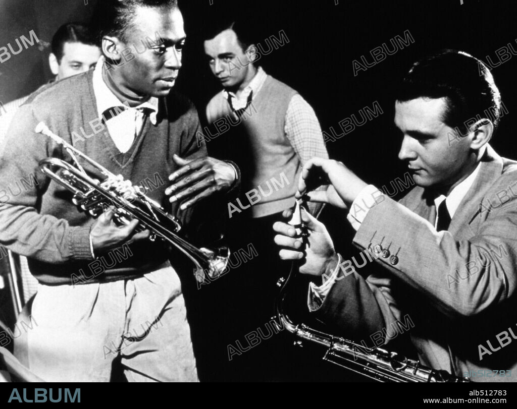 Tenor saxophonist Stan Getz and trumpeter Miles Davis at a recording session in New York City, 1951.