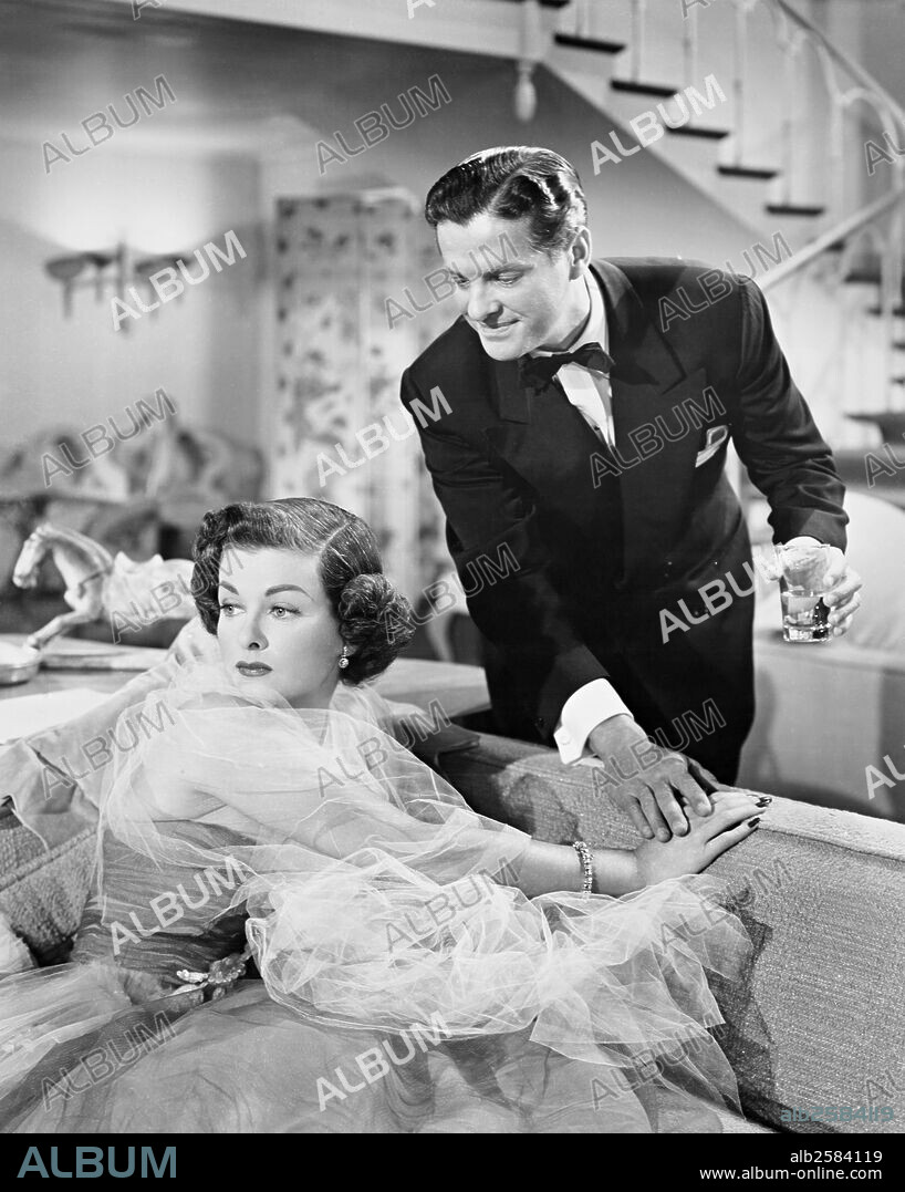 JOAN BENNETT and ROBERT CUMMINGS in FOR HEAVEN'S SAKE, 1950, directed by GEORGE SEATON. Copyright 20TH CENTURY FOX.