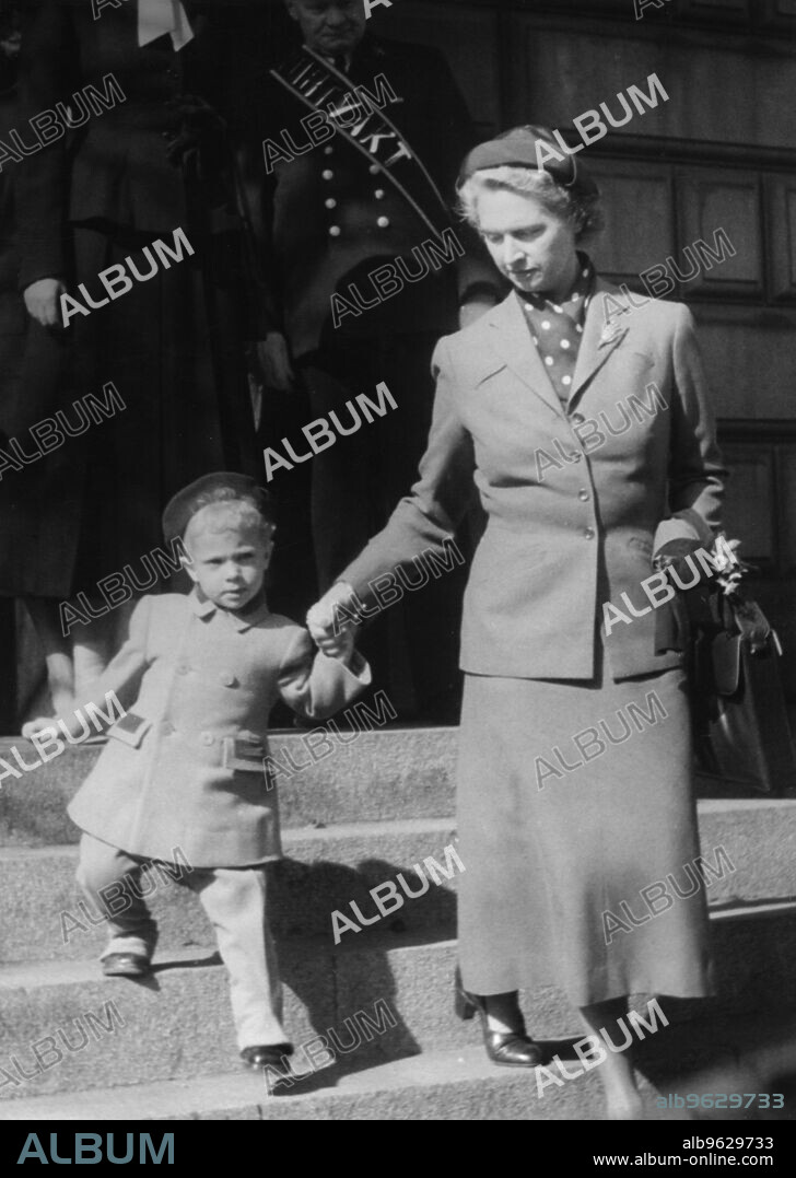 Princess Sibylla of Sweden returns from a trip abroad, 30 April 1949. Princess Sibylla of Saxe-Coburg and Gotha (1908-1972) was the widow of Prince Gustaf Adolf, Duke of Västerbotten, who was killed in a plane crash in 1947. Here she is met by returns from a trip abroad and is met by her children, Crown Prince Carl Gustaf (1946-) and Princess Christina (1943-). From the collection of Svenskt Fotoreportages.