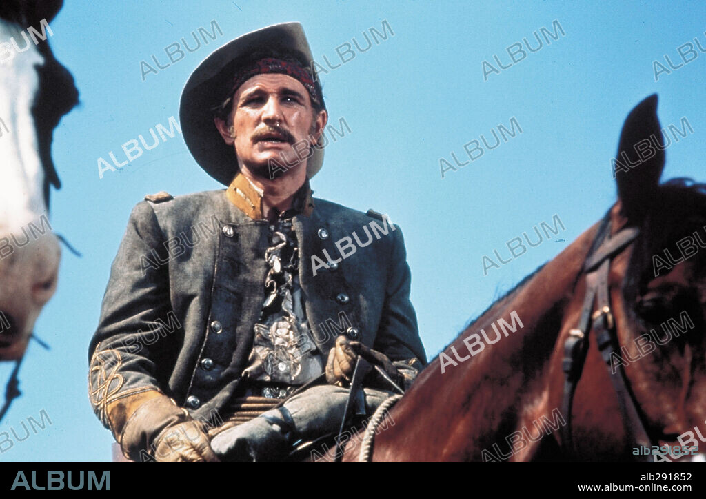 RICHARD HARRIS in MAJOR DUNDEE, 1965, directed by SAM PECKINPAH. Copyright COLUMBIA PICTURES.