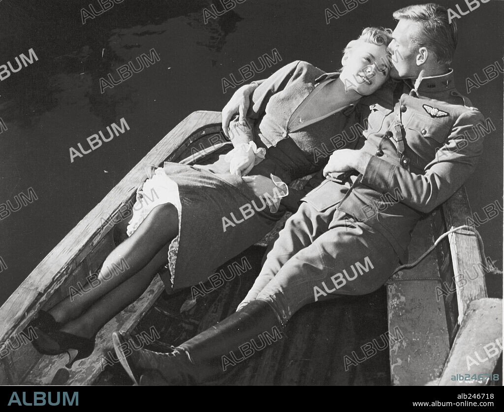 ETCHIKA CHOUREAU and TAB HUNTER in WITH YOU IN MY ARMS, 1958 (LAFAYETTE ESCADRILLE), directed by WILLIAM A. WELLMAN. Copyright WARNER BROTHERS.