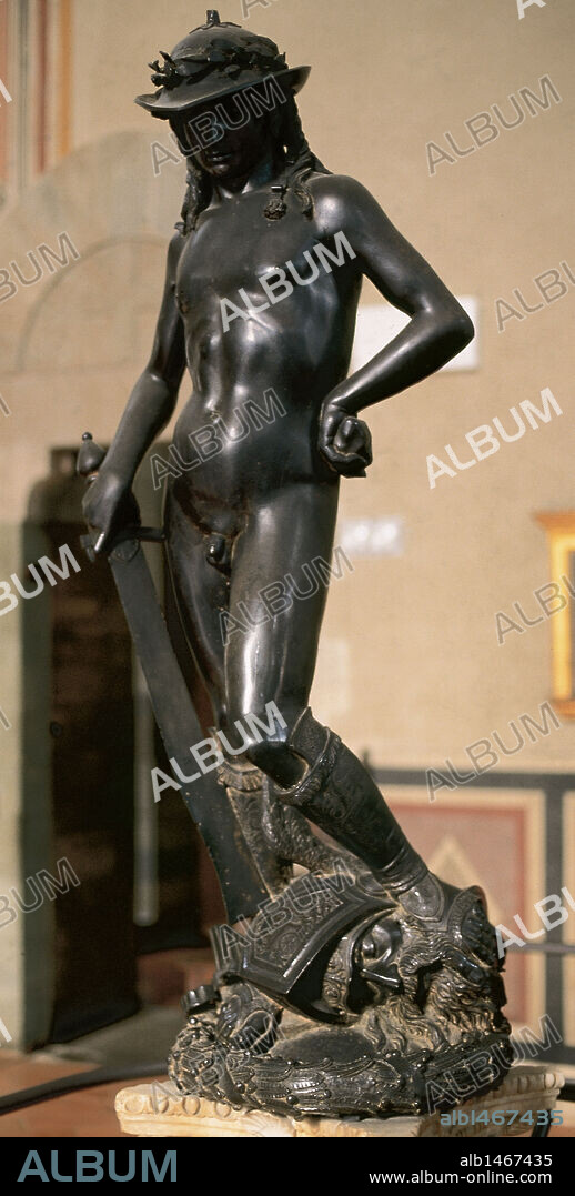 Donatello (1386-1466). Renaissance italian sculptor. David. Bronze statue sculpted between 1430 and 1440. It depicts David posed with his foot on Goliath's head after defeateing the giant. Bargello Museum. Florence. Italy.