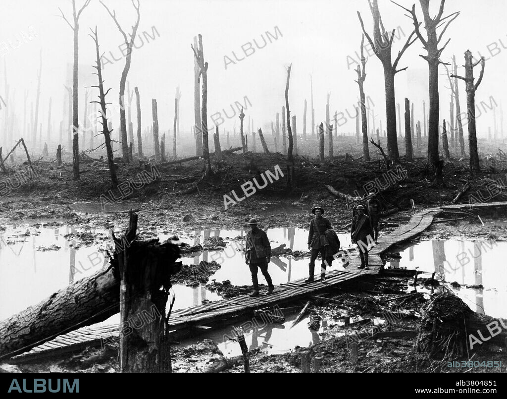 A scene in Chateau Wood, Ypres, Belgium, 29th October, 1917. The Battle of Passchendaele was a campaign of WWI, fought by the British and their allies against the German Empire. The battle took place on the Western Front, between July and November 1917, for control of the ridges south and east of the Belgian city of Ypres in West Flanders. Passchendaele lay on the last ridge east of Ypres, five miles from a railway junction at Roeselare, which was a vital part of the supply system of the German Fourth Army. The resistance of the German Fourth Army, unusually wet weather, the onset of winter and the diversion of British and French resources to Italy, allowed the Germans to avoid a general withdrawal. The campaign ended in November when the Canadian Corps captured Passchendaele. In his memoirs (1938) Lloyd George, British Prime Minister during WWI, wrote,.