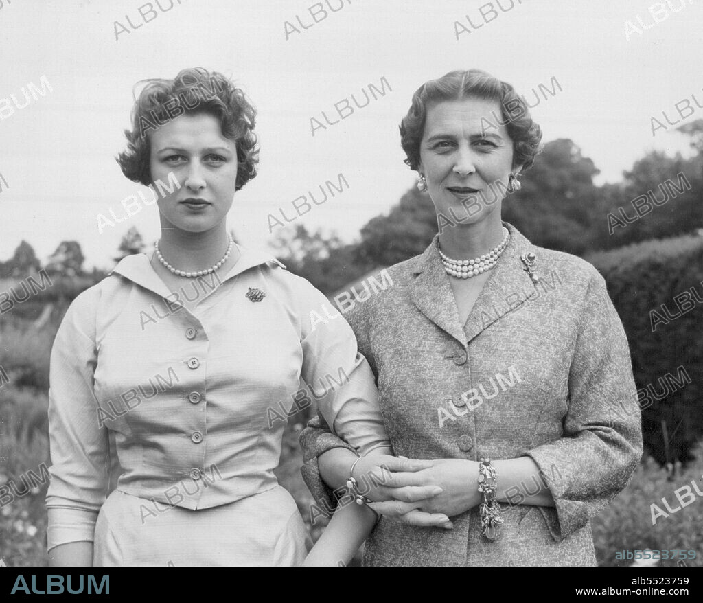Duchess and Daughter - Today's Picture -- Today's picture of the Duchess of Kent and her pretty, 17-year-old daughter Princess Alexandra, made at the home of the Duchess, "Coppins", Iver, Buckinghamshire. Late in August the Duchess and her daughter leave for a three-week tour of Canada. At the invitation of the Governor General. Three the Duchess will open the Canadian National Exhibition at Toronto, on August 27th, and a new generating station at Niagara Falls on August 30th. July 09, 1954. (Photo by Derek Brind, United Press Photo).