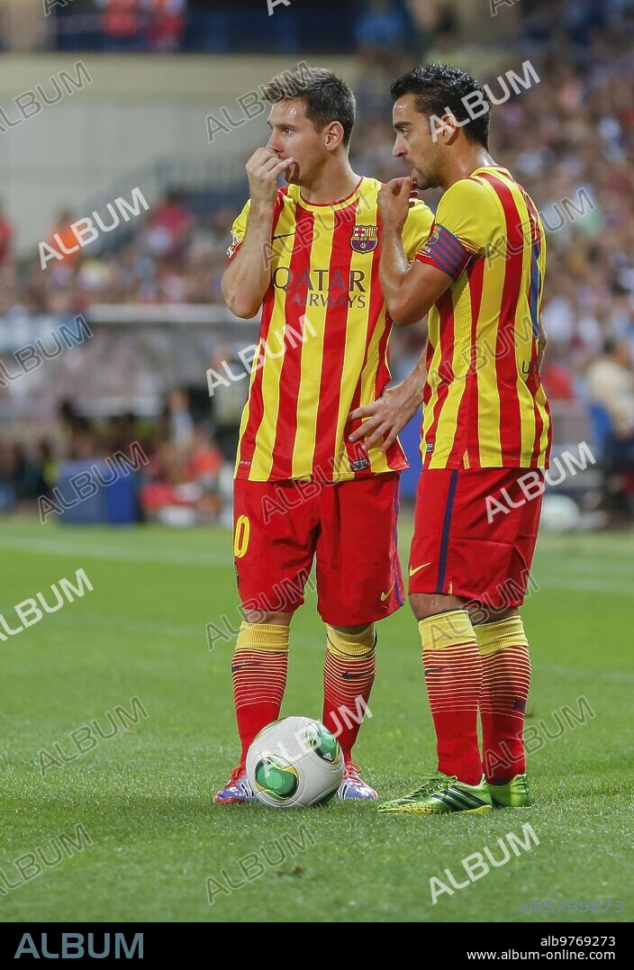 Madrid, 21 de agosto de 2013. Supercopa de España. Atletico de Madrid - Barcelona. Messi y Xavi. Foto: Ignacio Gil. Ä¶.ArchdcÄ¶.. Ignacio Gil.