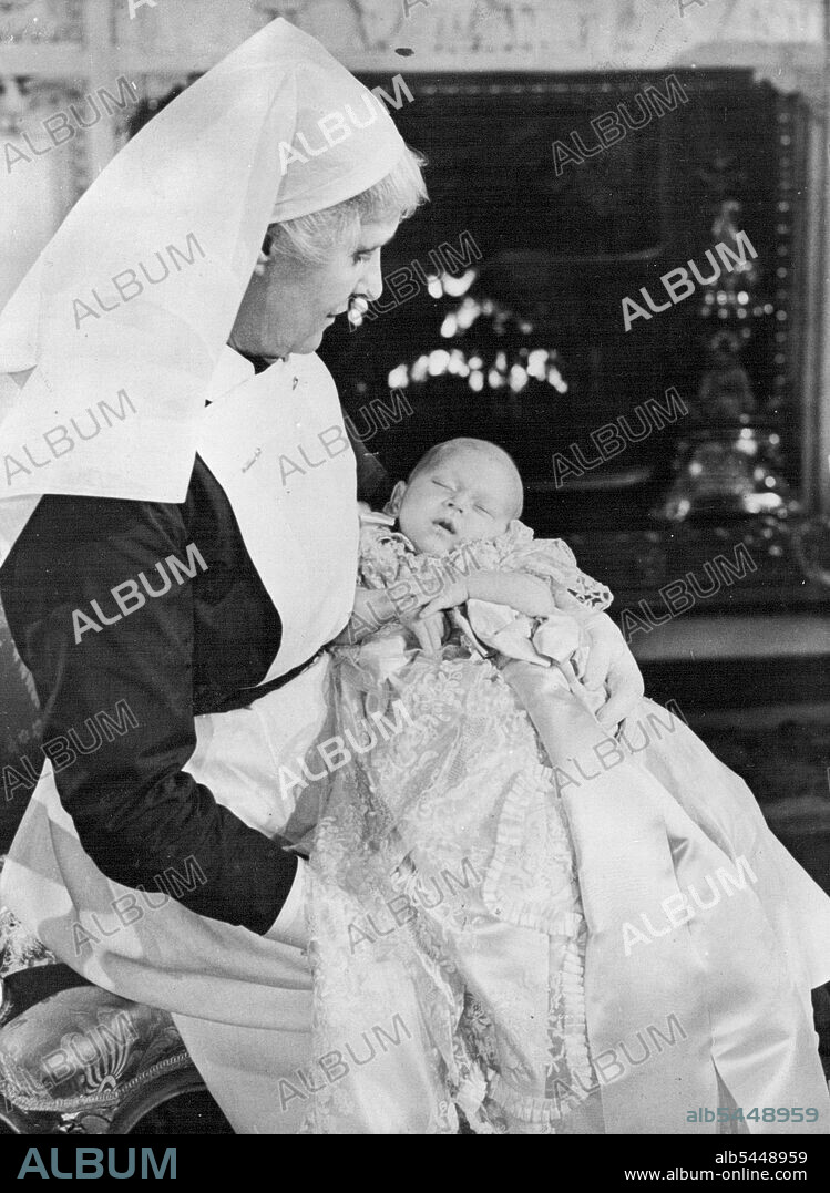 A Proud Nannie Sister Helen Rowe who attended Princess Elizabeth at the Birth of her baby, Holds the baby Prince after his Christening at Buckingham Palace Dec 15. Miss Rowe, British State certified Midwife attended the Duchess of Kent when Prince Michael was born. December 19, 1948. (Photo by Associated Press Photo).