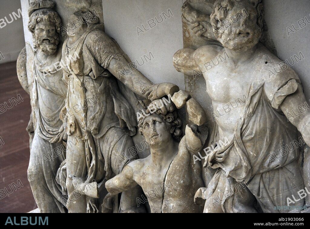 Pergamon Altar. Built by order of Eumenes II Soter. 164-156 BC by artists of the school of Pergamon. Marble and limestone. Gigantomachy. West frieze. Detail. Left to right: Nereus, Doris, giant and Oceanus. Pergamon Museum. Berlin. Germany.