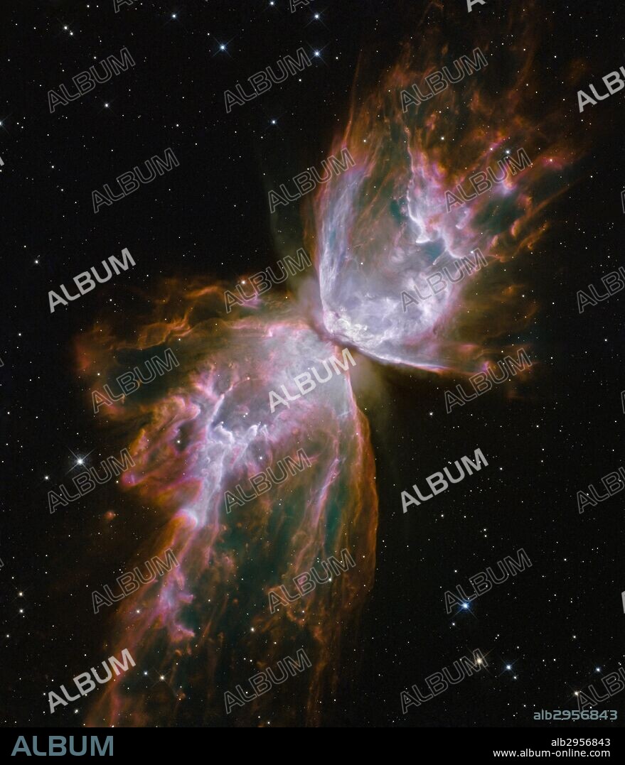 Butterfly shape emerges from Stellar Demise in Planetary Nebula NGC 6302. Photo taken by the Hubble Telescope. Dated 2009.