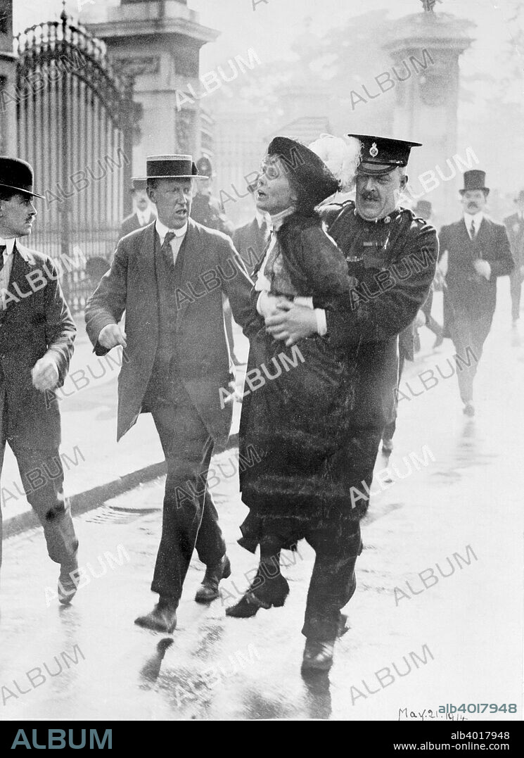 Emmeline Pankhurst arrested by Superintendent Rolfe outside Buckingham Palace, London, May 1914. Mrs Pankhurst was trying to present a petition to the king. The Suffragette newspaper reported that as she was driven away to Holloway Gaol she called out: 'Arrested at the gates of the Palace. Tell the King!' Pankhurst was jailed several times during the fight to get women the vote. Rolfe died two weeks later of heart failure.