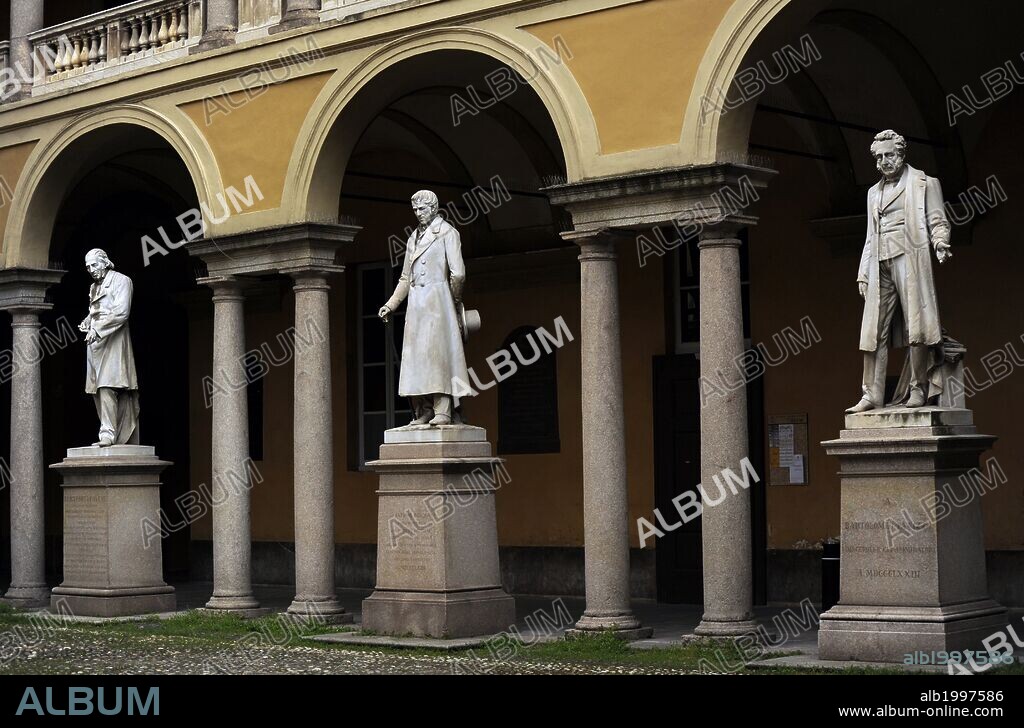 Italy. Pavia.  Courtyard in University of Pavia. From left to right, statues: Luigi Porta Pavese (1800-1875),  Antonio Maria Bordoni (1789-1860) and Bartolomeo Panizza (1785-1667).
