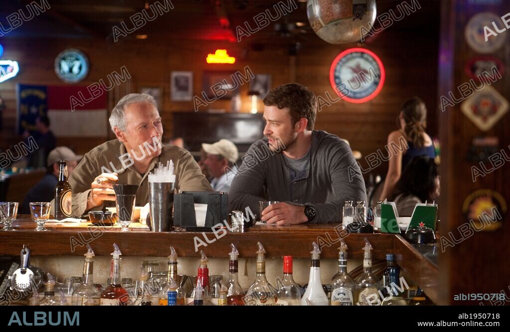CLINT EASTWOOD and JUSTIN TIMBERLAKE in TROUBLE WITH THE CURVE, 2012, directed by ROBERT LORENZ. Copyright MALPASO PRODUCTIONS.