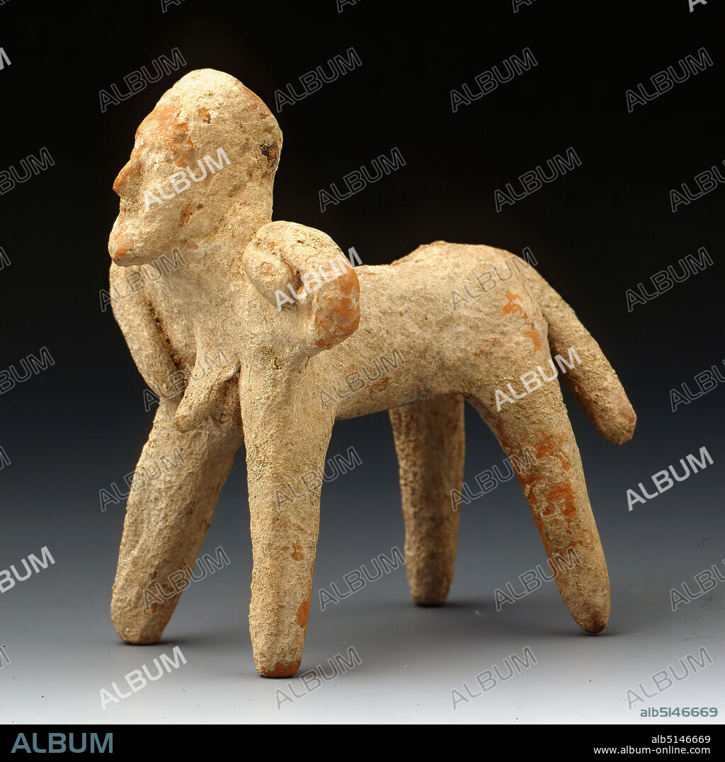 Centaur, Gift from Gertrud Benndorf (Hamburg), Clay, hand-modeled, Clay, hand-modeled, Total: Height: 8.8 cm; Width: 5.5 cm; Depth: 8.2 cm, Ceramics, Small sculptures/small sculptures, Centaurs, late archaic, Greek antiquity, The centaur stands on the floor with its four slightly flared but not plastically modeled legs. The forelegs are part of a shortened male body with arms and genitals, which is followed by the horse's body with tail at the back. The hand of the left arm holds a ball on the shoulder, ready for throwing; the right arm hangs down. The bearded, easily to the back inclined head carries a bandage in the hair. Centaurs encounter Greek mythology in various legends: In Thessaly, they seize the bride at the wedding of Prince Peirithoos and try to rob the other women present. The ensuing battle symbolized the struggle between good and evil, and enjoyed great popularity in ancient art. In Arcadia, the story is told of Heracles' visit to the centaur Pholos and the following battle against his wild conspecifics. In another myth, Heracles killed the centaur Nessos, who had committed suicide against the wife of the hero. The oldest representation of a centaur comes from a grave in Lefkandi (Euboia Island) and is dated to the 10th century BC. This terracotta forms a group with technically very similar figures in Munich, Würzburg and Leipzig.