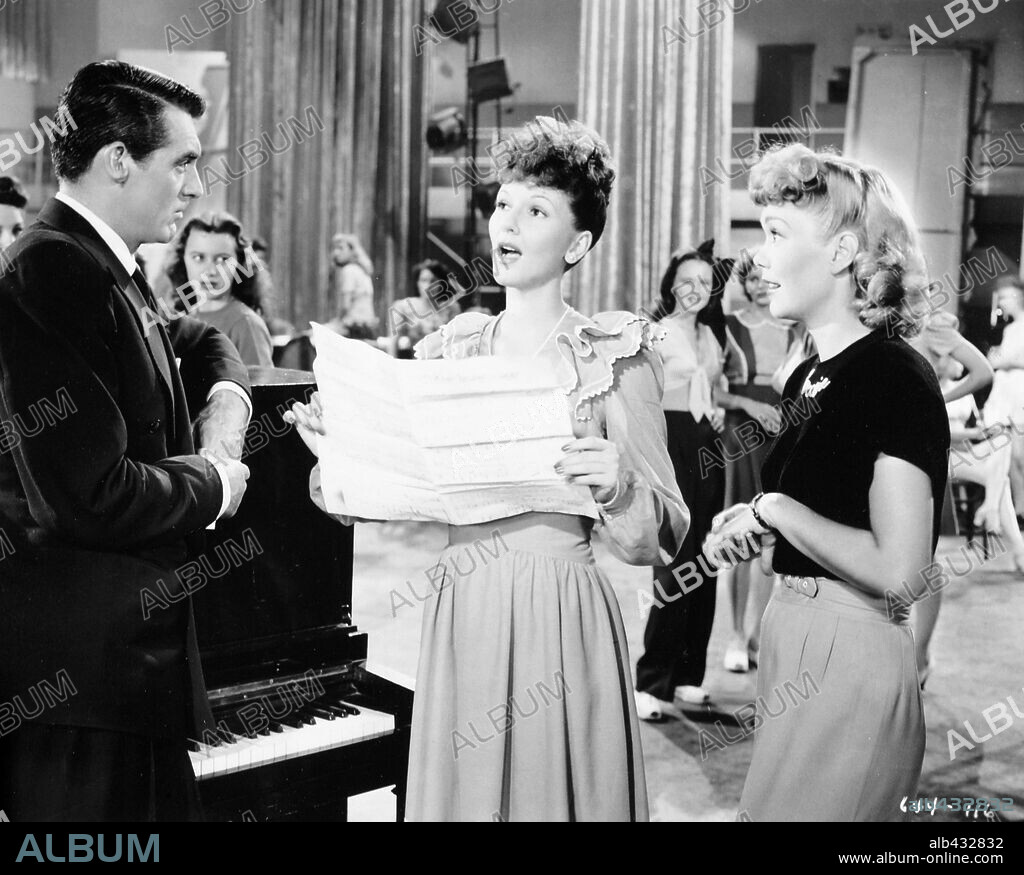 CARY GRANT, JANE WYMAN and MARY MARTIN in NIGHT AND DAY, 1946, directed by MICHAEL CURTIZ. Copyright WARNER BROTHERS.