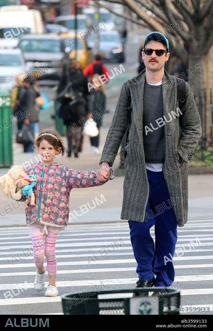 April 12, 2018 - New York, New York, United States - Actor Tom Sturridge walks with his daughter Marlowe in The West Village on April 12 2018 in New York City. 12/04/2018