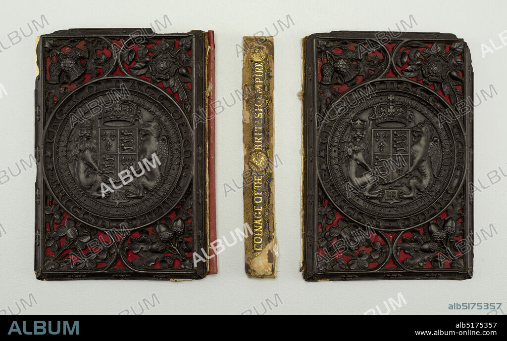 Book cover, Gutta-percha, paper, buckram, leather, Rectangular, front (a) and back (b) book covers of dark brown gutta-percha, each with large circular seal and heraldic device in center, within pierced design of foliage and acorns. Each mounted on red paper and leather binding. Marbleized end papers attached., England, 19th century, containers, Decorative Arts, Book cover.
