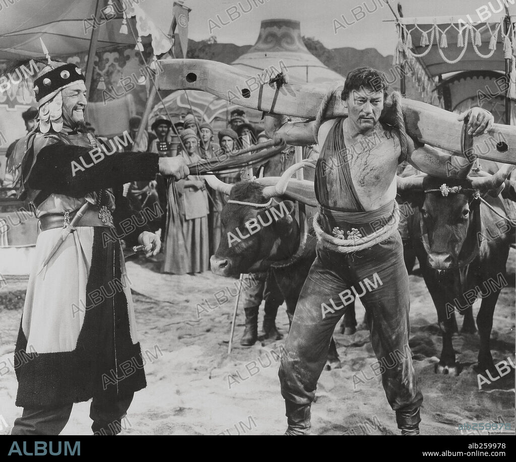 JOHN WAYNE dans THE CONQUEROR, 1956, réalisé par DICK POWELL. Copyright RKO.