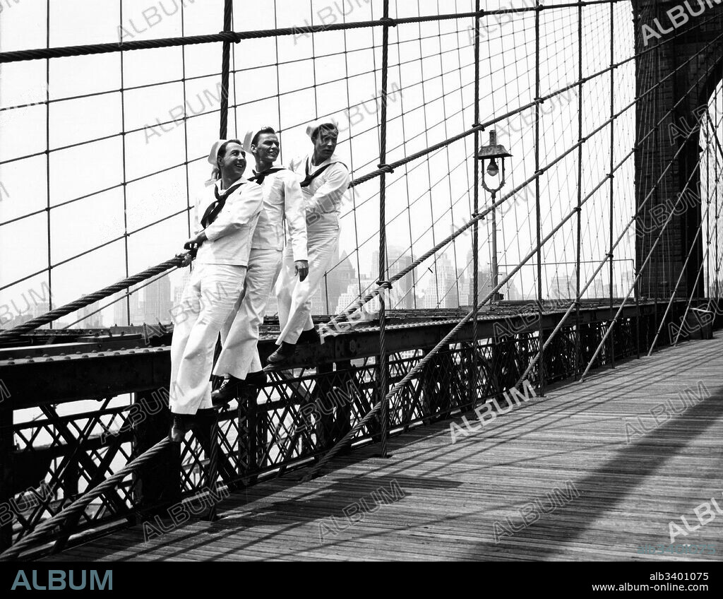 FRANK SINATRA, GENE KELLY and JULES MUNSHIN in ON THE TOWN, 1949, directed by GENE KELLY and STANLEY DONEN. Copyright M.G.M.