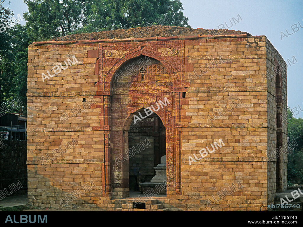 Quwwat al Islam Mosque, Mausoleum of Iltutmish, by Unknown Artist, 1235, 13th Century,. India, National Capital Territory of Dehli -NCT, Delhi, Delhi, Mosque Quwwat al-Islam. Outside view of the Mausoleum of Iltuthish, 1235, masonry arch. The tomb consists of a square dome covered building with an underground crypt and was most probably evidently built by indigenous workers workmen. Entrance portal arch ogival pointed arch geometric decoration inscriptions. 2009 photograph.