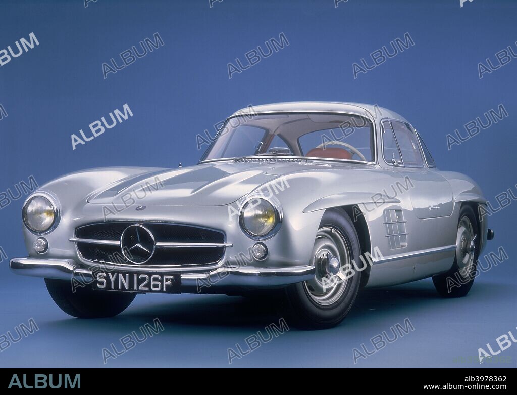 1957 Mercedes Benz 300 SL Gullwing. Mercedes introduced the 300SL, its most famous and dramatic post-war model in 1954. It was a road version of a successful racing car which featured a 3 litre, fuel injected engine capable of  a top speed of 140 mph. The outstanding feature of the car was its 'Gullwing' doors. The driver and passenger doors were hinged in the centre of the roof and  opened upwards. Production of the 300 SL Gullwing stopped in 1957 after 1400 examples had been made.