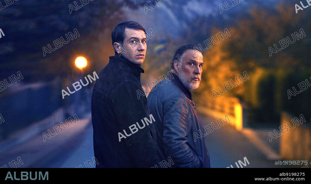 BASTIEN BOUILLON and BOULI LANNERS in THE NIGHT OF THE 12TH, 2022 (LA NUIT DU 12), directed by DOMINIK MOLL. Copyright HAUT ET COURT.