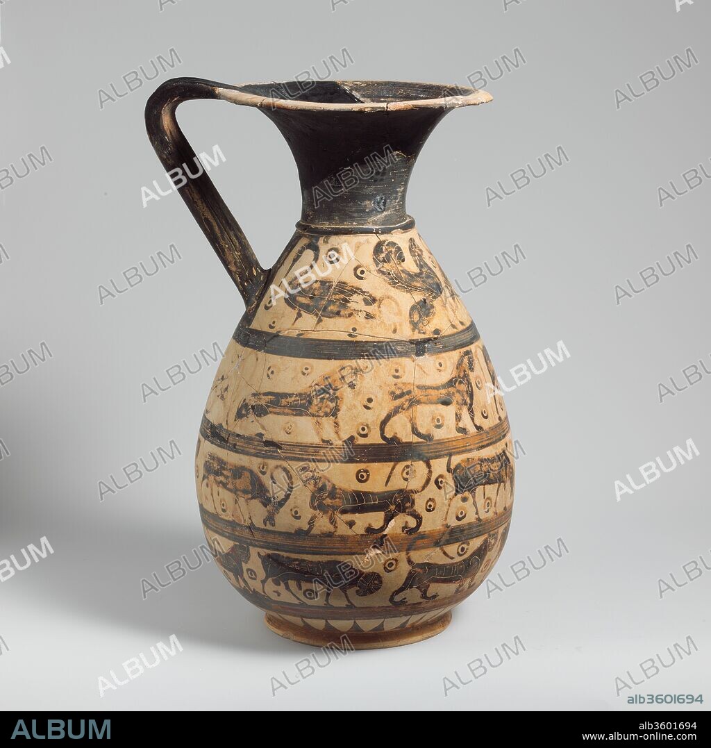 Terracotta oinochoe:olpe (jug). Culture: Greek, Corinthian. Dimensions: H. 14 5/16 in. (36.4 cm). Date: ca. 630-615 B.C..
Four friezes with animals
Olpai were greatly favored by Corinthian artists, particularly during the last three decades of the seventh century. The decoration consists almost exclusively of animal friezes; there are virtually no examples with narrative figural subjects.