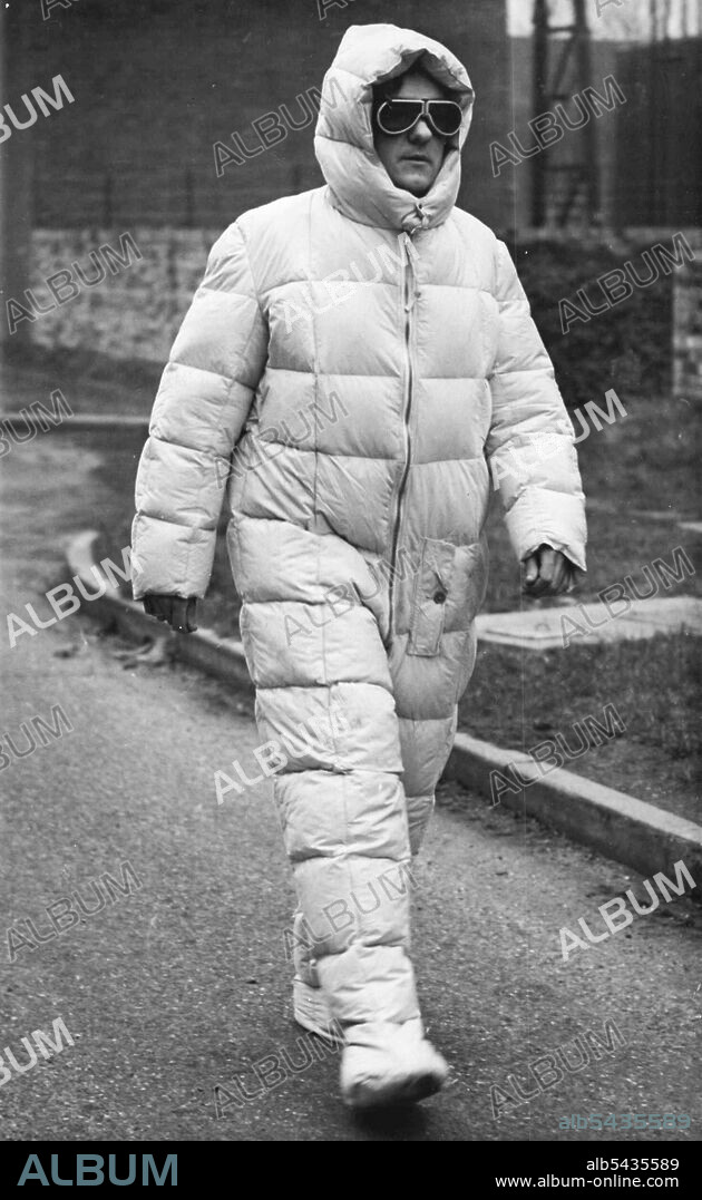 Arctic Suit - Squadron Leader R. H. Blackmore, senior navigation officer of the R.A.F. Arctic Flight, is seen wearing the special suit and anti-glare goggles that he will wear in the polar regions. The flight consisted of seven Lancaster bombers of the R.A.F. Empire air navigation school which left last night, Feb 16, on the first leg of the 5500 mile journey over the Atlantic which will take them well inside the Artic circle. February 17, 1948. (Photo by Associated Press Photo).