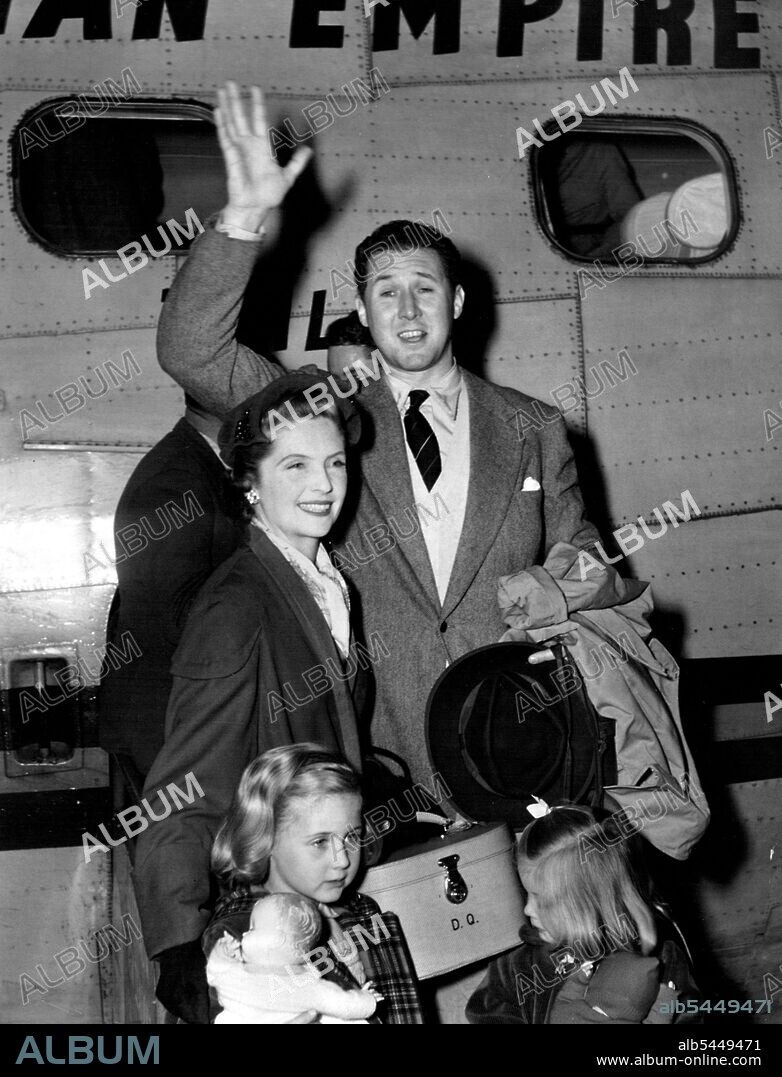 Mr. and Mrs. Anthony Quayle....with their children Rosanne and Jennifer arriving at Rose Bay Flying Base to day by T.E.A.L.They are members of the Stafford on Anvon Shakesperian Memorial Company that arrived from London. April 19, 1953. (Photo by John Aloysius Mulligan/Fairfax Media).