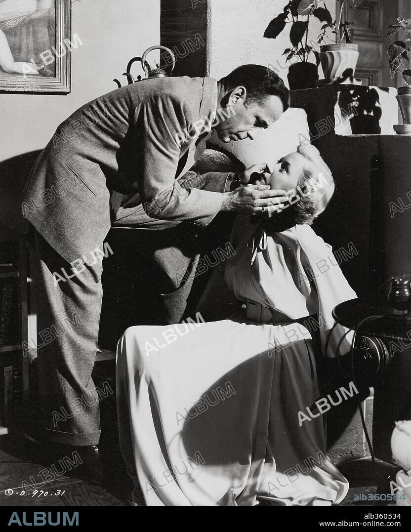 GLORIA GRAHAME and HUMPHREY BOGART in IN A LONELY PLACE, 1950, directed by NICHOLAS RAY. Copyright COLUMBIA PICTURES.