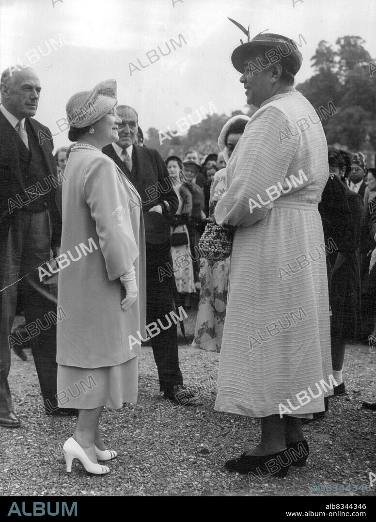 Queens must at HatfieldQueen Elizabeth the Queen mother is shown here with tall Queen Salote of Tonga at the Garden Party given at Hatfield house, Hertfordshire, today may 31 to colonial visitors in England for the coronation. Despite her flat heels, Queen Salote towered above England's ***** mother and most of the men too at a coronation garden. June 01, 1953.