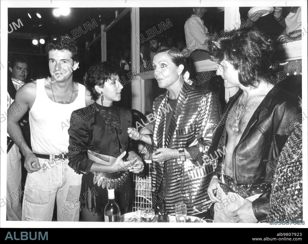 July 1988. Presentation party of the album "Descanso Dominical" by the Mecano group with Important Figures from the Spanish scene. In the Image, the three Components, Nacho Cano, Ana Torroja, and Jose Maria Cano Accompanied by Sara Montiel.