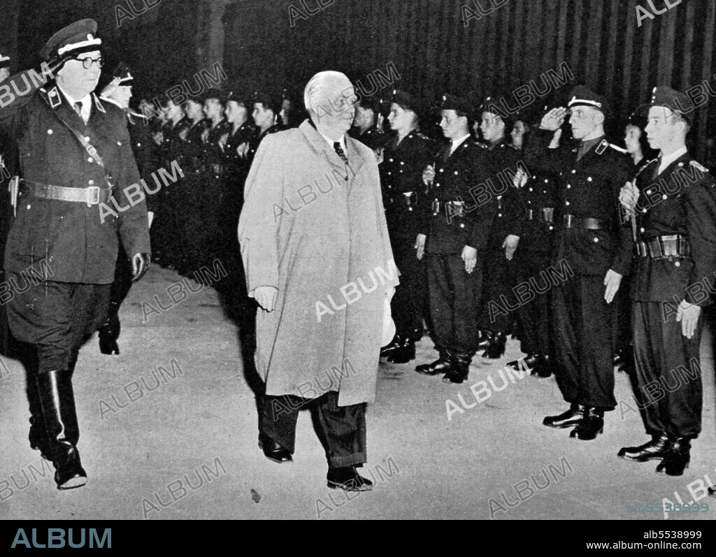 The new President of East Germany, Herr Wilhelm Pieck inspecting the blue uniformed People's Police. Friedrich Wilhelm Reinhold Pieck (3 January 1876 - 7 September 1960) was a German communist politician who served as the chairman of the Socialist Unity Party from 1946 to 1950 and as president of the German Democratic Republic from 1949 to 1960.