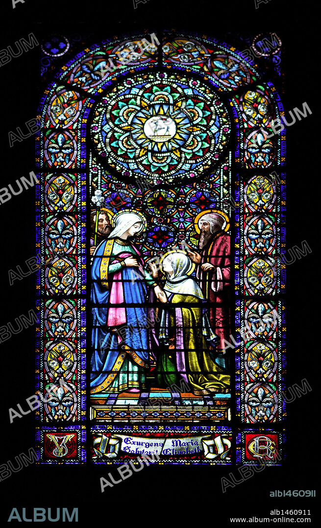 Stained glass window depicting The Visitation. Drawn by Enric Monserda_ (1850-1926) and fulfilled in workshops of Eudald Ramon Amigo (1828-1885). Abbey of Montserrat. Catalonia. Spain.