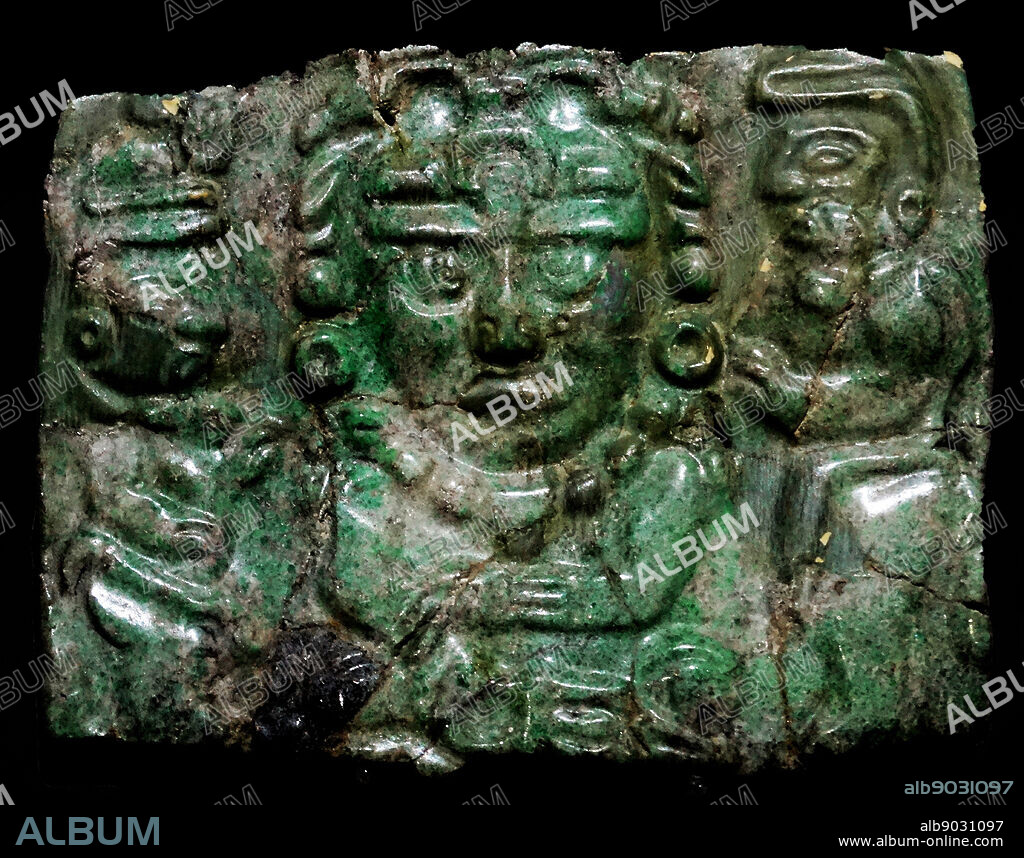 Jade pectoral with a representation of the Mayan Sun God Aj K'in or K'inich Ajaw. 600-900 AD. Chichen Itza, Yucatan Mexico.